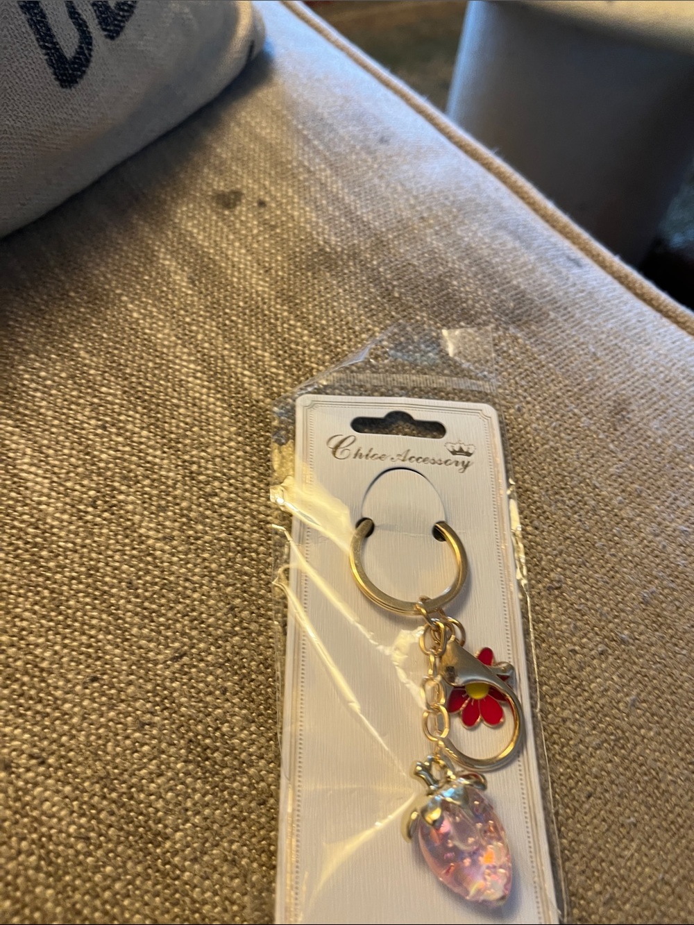 Chloe Gold-tone Keyring with Pink Crystal and Red Flower Charm